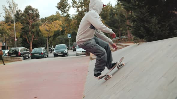 Professional Skater Jump with Kickflip Flip Trick on Board, Skateboarder Ollie, Skateboarding