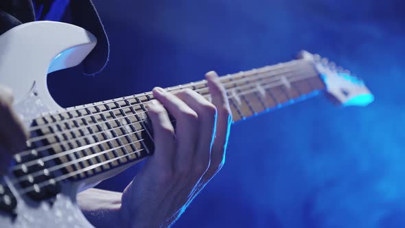 Guitarist`s Hands Playing on Guitar