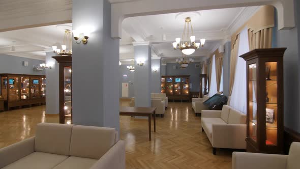 Sofas for Visitors Rest in Hallway with Exposed Items