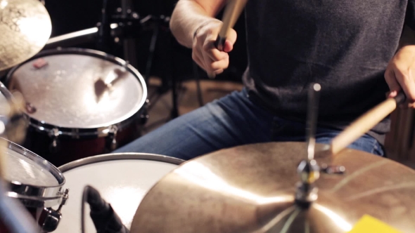 Male Musician Playing Drums And Cymbals At Studio 7