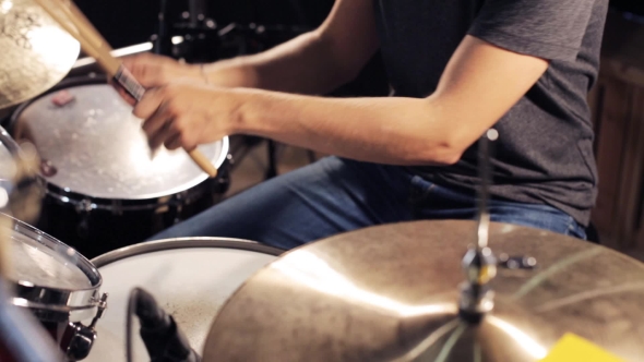 Male Musician Playing Drums And Cymbals At Studio 8