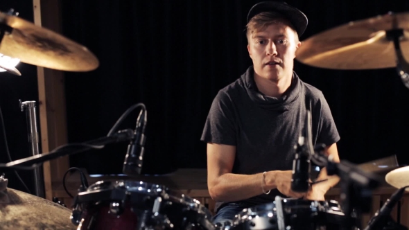 Male Musician Playing Drums And Cymbals At Studio 14