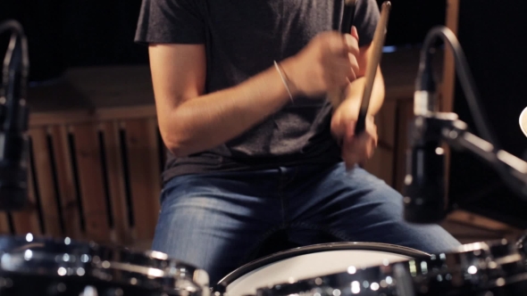 Male Musician Playing Drums And Cymbals At Studio 20