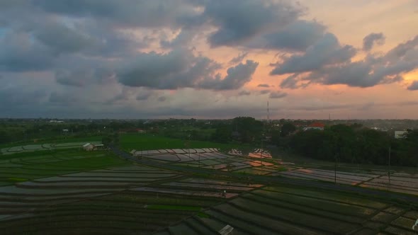 Wet Rice Fields And Asian Village At Sunset Aerial