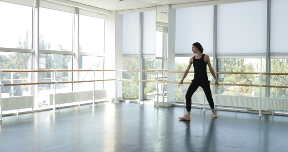 Dancing Man Modern Ballet Dancer Performs Dance In Studio