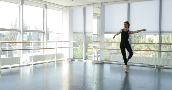 Dancing Man Modern Ballet Dancer Performs Dance in Studio