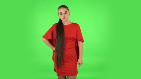 Pretty Young Woman Is Scolding, Shaking Her Index Finger and Threatening, Green Screen