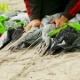 Man Wrapping Parachute Shroud Lines On The Ground - VideoHive Item for Sale