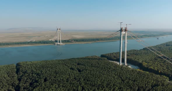 Twin Towers Of The Braila-Tulcea Bridge Now Connected With Suspension Cable Over Danube River