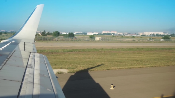 View Of Sky From Aircraft Windows While Driving On The Runway