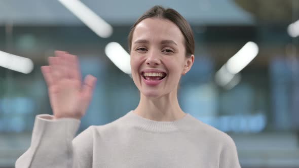 Portrait of Beautiful Woman Waving, Welcoming