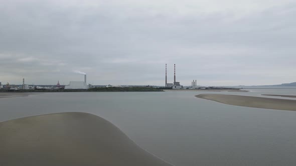 Lonely east coast Sandymount Strand power plant Dublin Bay Ireland