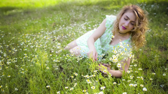 Girl Resting On The Nature. Beautiful Girl Lying On The Field.