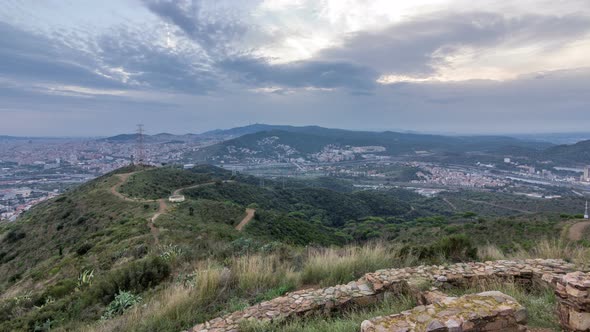 Barcelona and Badalona Skyline with Roofs of Houses and Sea on the Horizon at Evening Timelapse