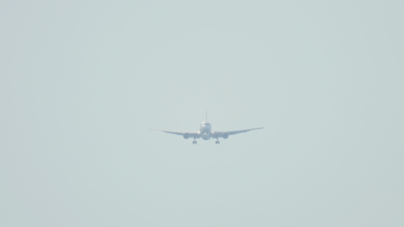 Widebody Airplane Approaching Over Ocean