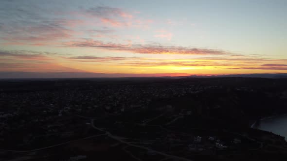 Aerial Footage Recorded with Drone Flying Over the Sea Cost on the Sunrise