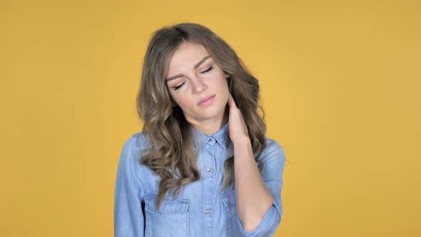 Young Girl with Neck Pain, Yellow Background