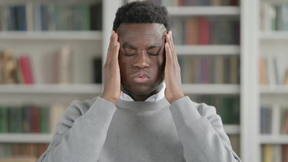 Portrait of African Man Having Headache