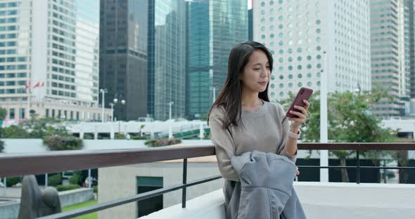 Woman Use of Mobile Phone in Hong Kong City