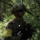 Military Weapons Are In The Woods. The Soldier Is Moving In The Forest. Armed Man. - VideoHive Item for Sale