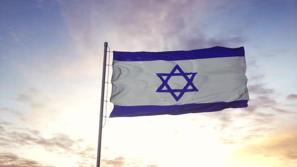 The National Flag of Israel Waving in the Wind Dramatic Sky Background