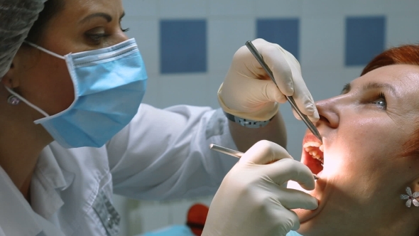 Examination Of The Oral Cavity Of The Patient
