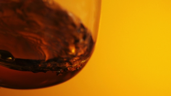 The Glass With Splashes Cognac