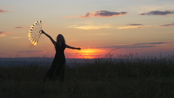 Flaming Torches At Sunrise