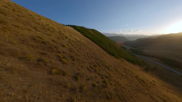 FPV Sports Drone Shot Flying Natural Mountain Dry Grass Texture Sunset Sunrise Natural Environment