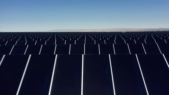 Solar Panels on the Background of the Desert, Blue Sky, Alternative Energy  alt