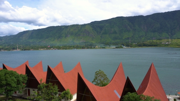 Panorama Of Toba Lake With Traditional Batak-style Roofs From Samosir Island