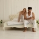 Couple Lying Bed Using Smart Phone - VideoHive Item for Sale