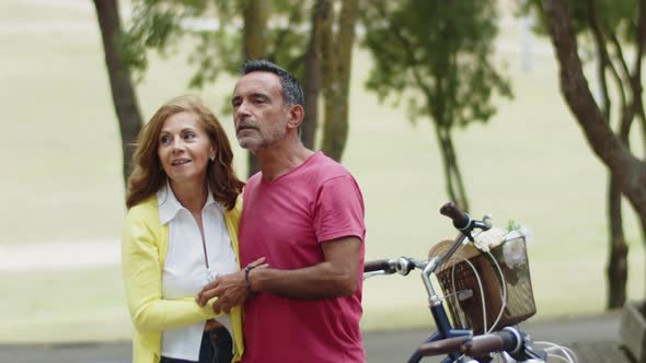 Happy Lovers Standing Hugging Each Other in Park