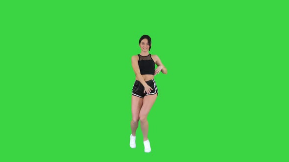 Sexy Dancing Young Sporty Woman on a Green Screen, Chroma Key