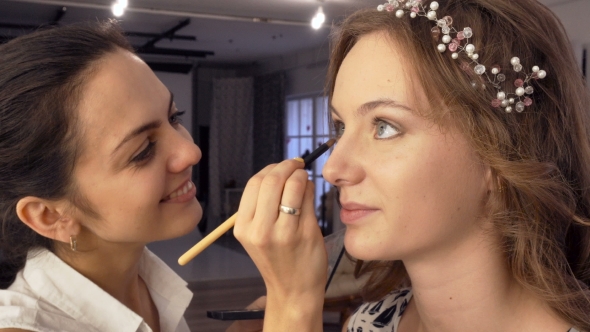 Makeup Artist Doing Makeup For Model