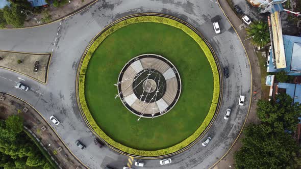 Aerial view look down green grass at roundabout