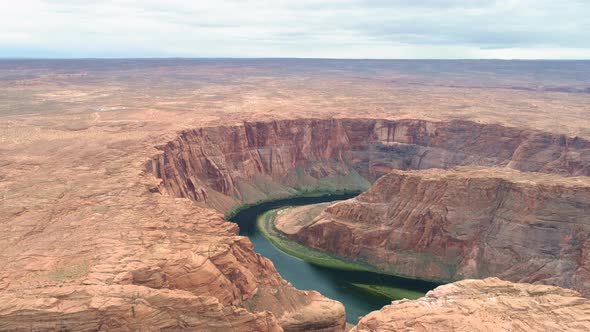 Drone Flying Along Beautiful Massive Red Horse Shoe Bend Canyon,  Aerial Video