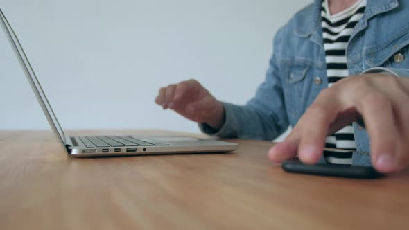 Man works at the laptop in office