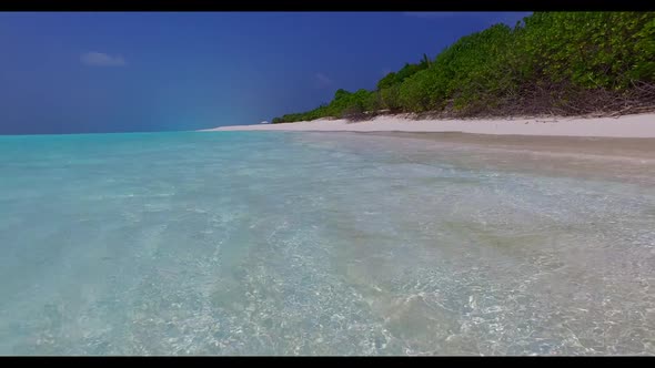 Aerial drone view texture of marine tourist beach holiday by blue lagoon with clean sandy background