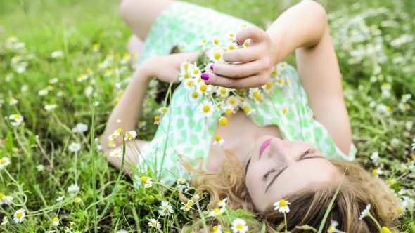 Girl Resting On The Nature. Beautiful Girl Lying On The Field.