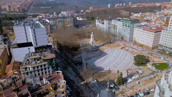 A monument stands alone in aerial view of Madrid Spain
