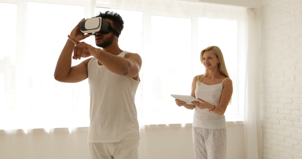 Man Using Virtual Reality Glasses Woman Holding Digital Tablet Computer 3d Technology Concept, Mix