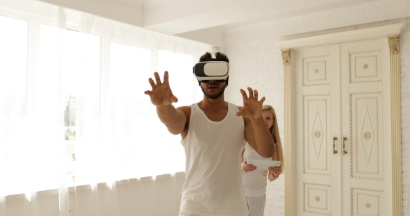 Man Using Virtual Reality Glasses Woman Holding Digital Tablet Computer 3d Technology Concept, Mix