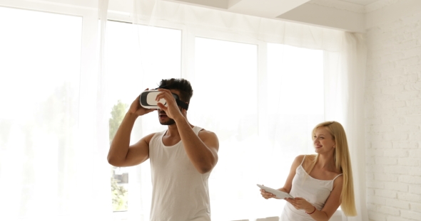 Man Using Virtual Reality Glasses Woman Holding Digital Tablet Computer 3d Technology Concept, Mix