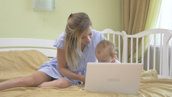 Baby Typing On a Laptop Keyboard.