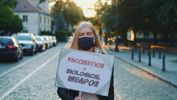 Young Woman Protesting Against Vaccination Like Biological Weapon