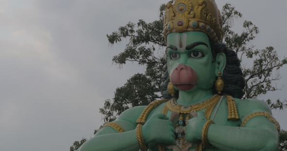 Seen Head With Hands Of Statue Of Hanuman At Batu Caves, Malaysia