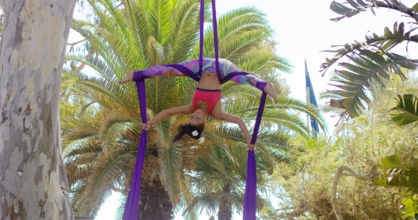 Supple Gymnast Doing An Acrobatic Dance Routine