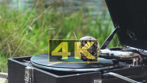 Old Record Spinning on a Real Gramophone. Retro Style