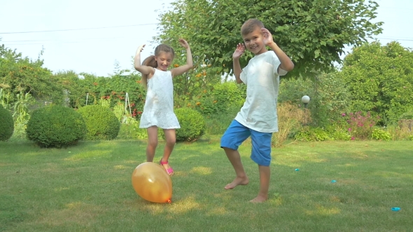 Children Burst Balloon In The Garden